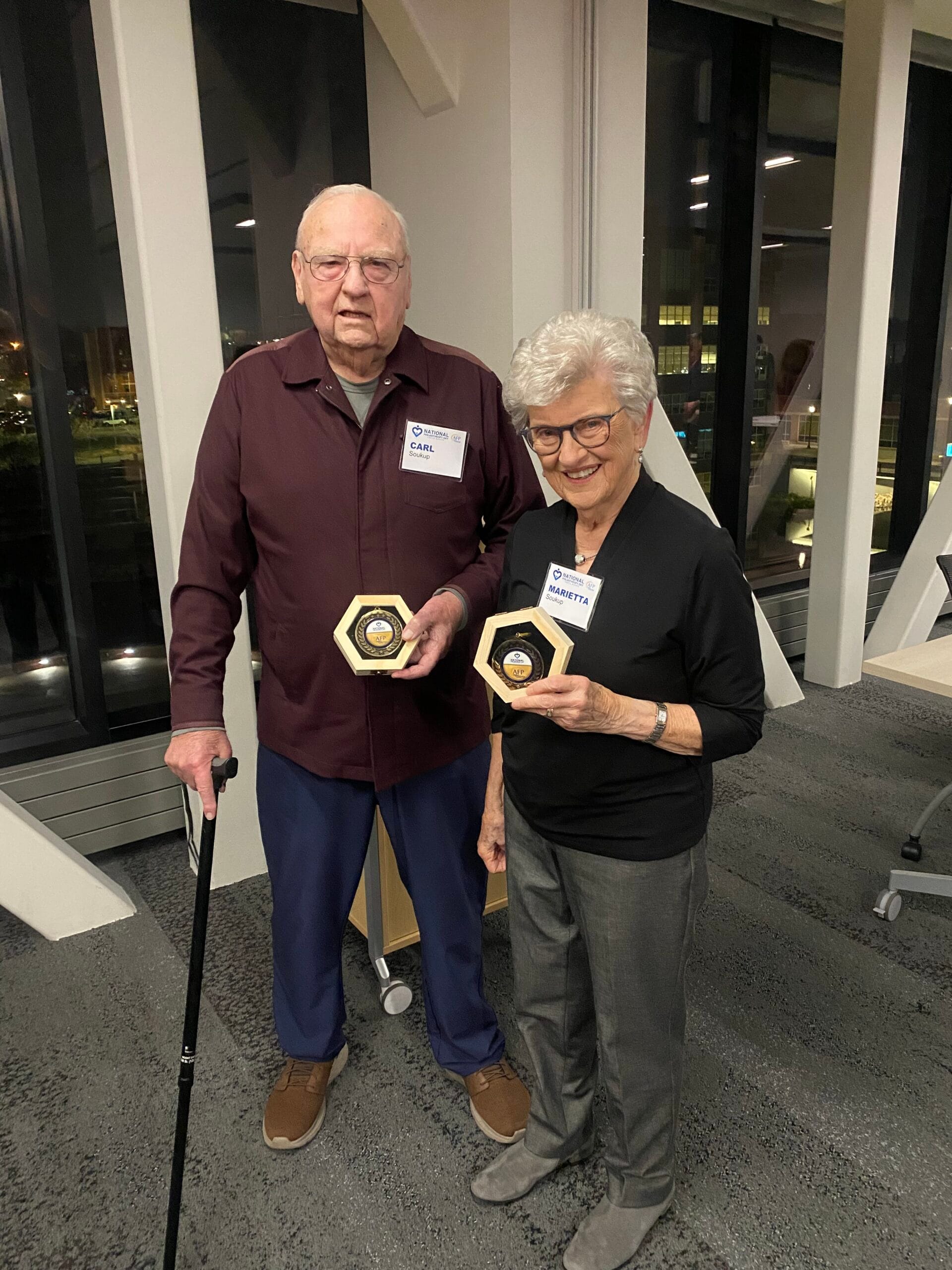 Carl and Marietta Soukup with awards scaled